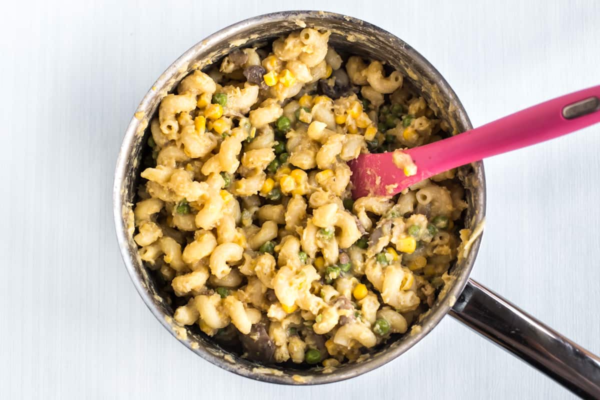 Cheesy lentil pasta in a pan.