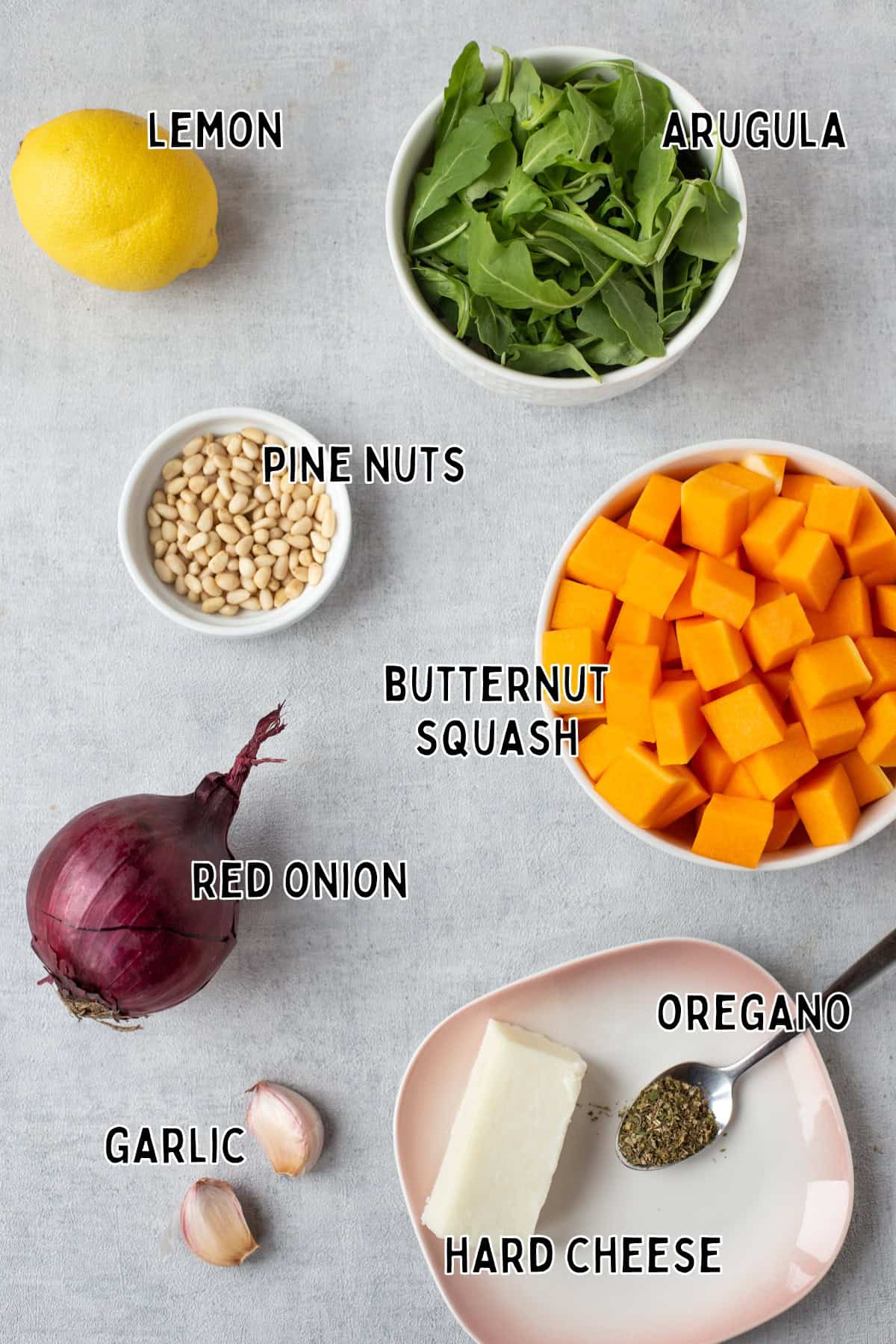 Ingredients for roasted butternut squash salad laid out with text overlay.